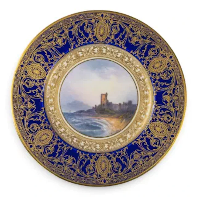 A Royal Worcester plate decorated with landscape scene of Aberystwyth