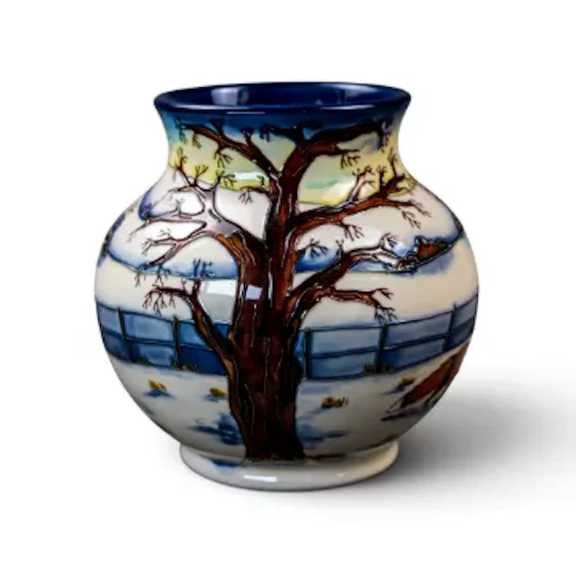 A Moorcroft vase in the Woodside Farm design by Anji Davenport, first