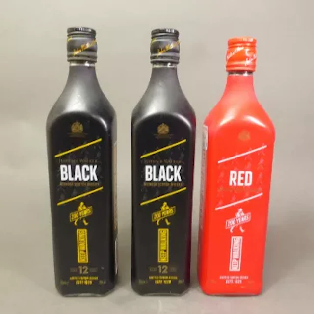 Three bottles of Johnnie Walker blended whisky, 2 x 12-year-old Black