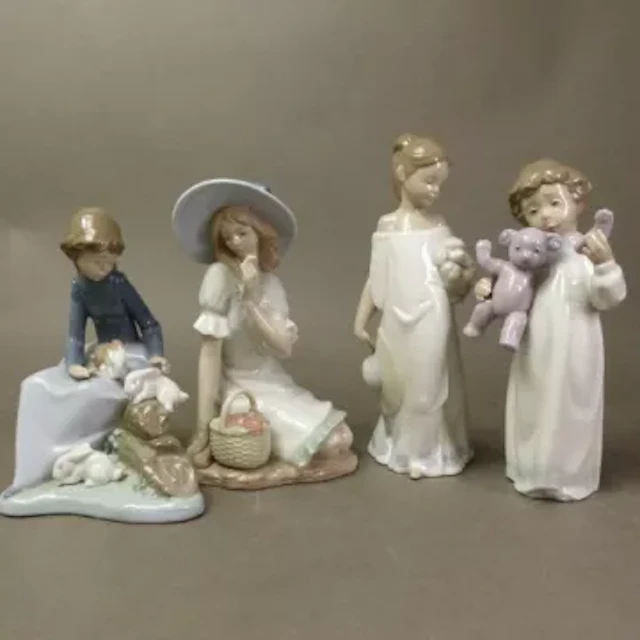 Four Nao figurines, models 1433, 1365, 1026 and 1424, tallest 22cm (4).