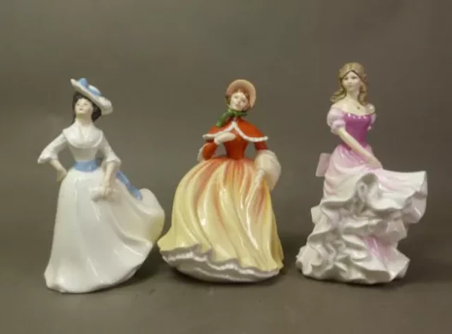 Royal Doulton figurines Sophie HN3995, Autumn HN5323 and Margaret HN2397 (3).