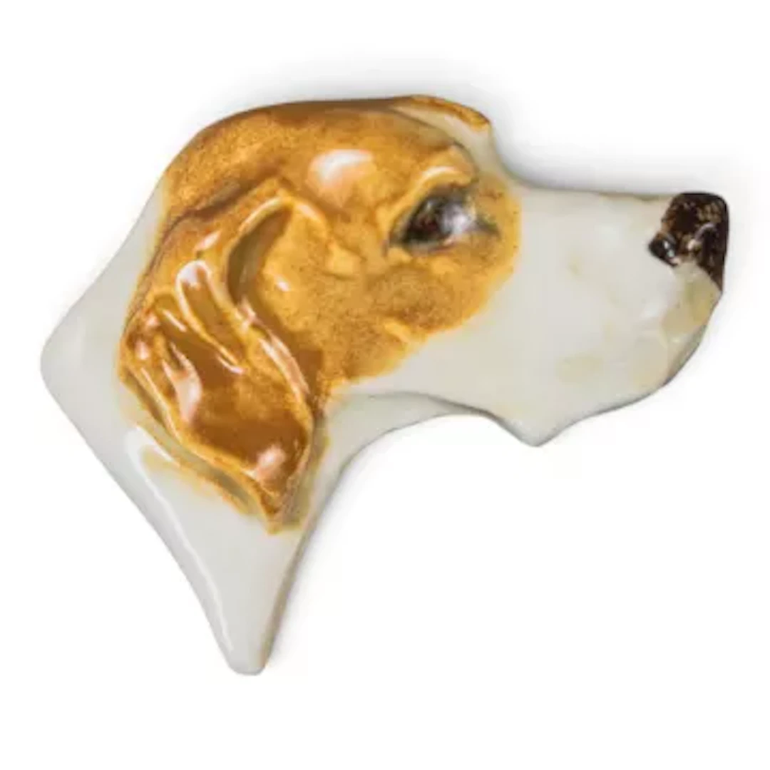 Hand painted pottery brooch in the form of a dogs head, hound, 4.5cm x .5cm.