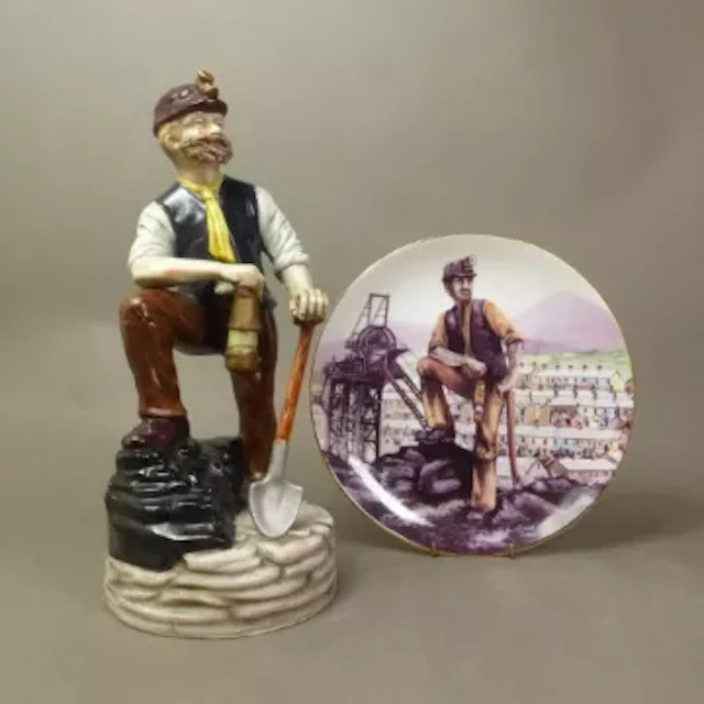 Large ceramic figure of a coal miner, height 31cm, together with a