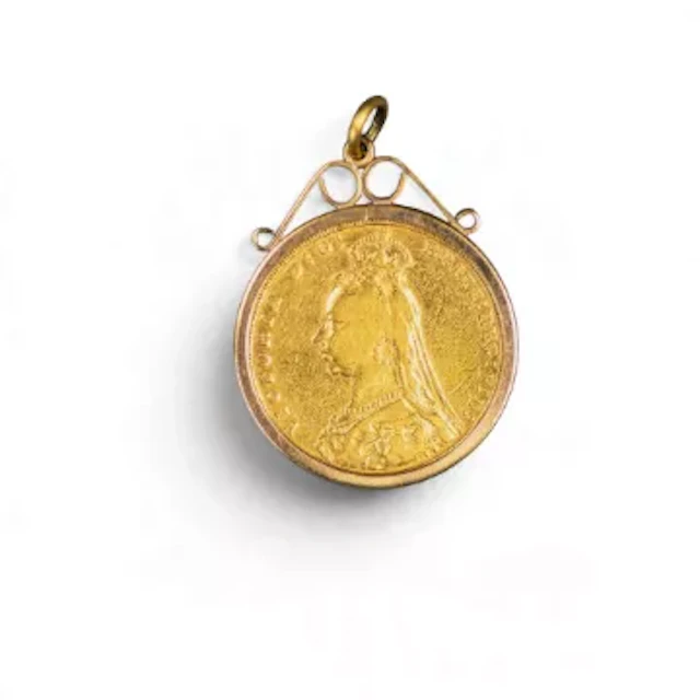 Victoria gold FULL sovereign, dated 1890, in 9ct gold mount, 9.6g.