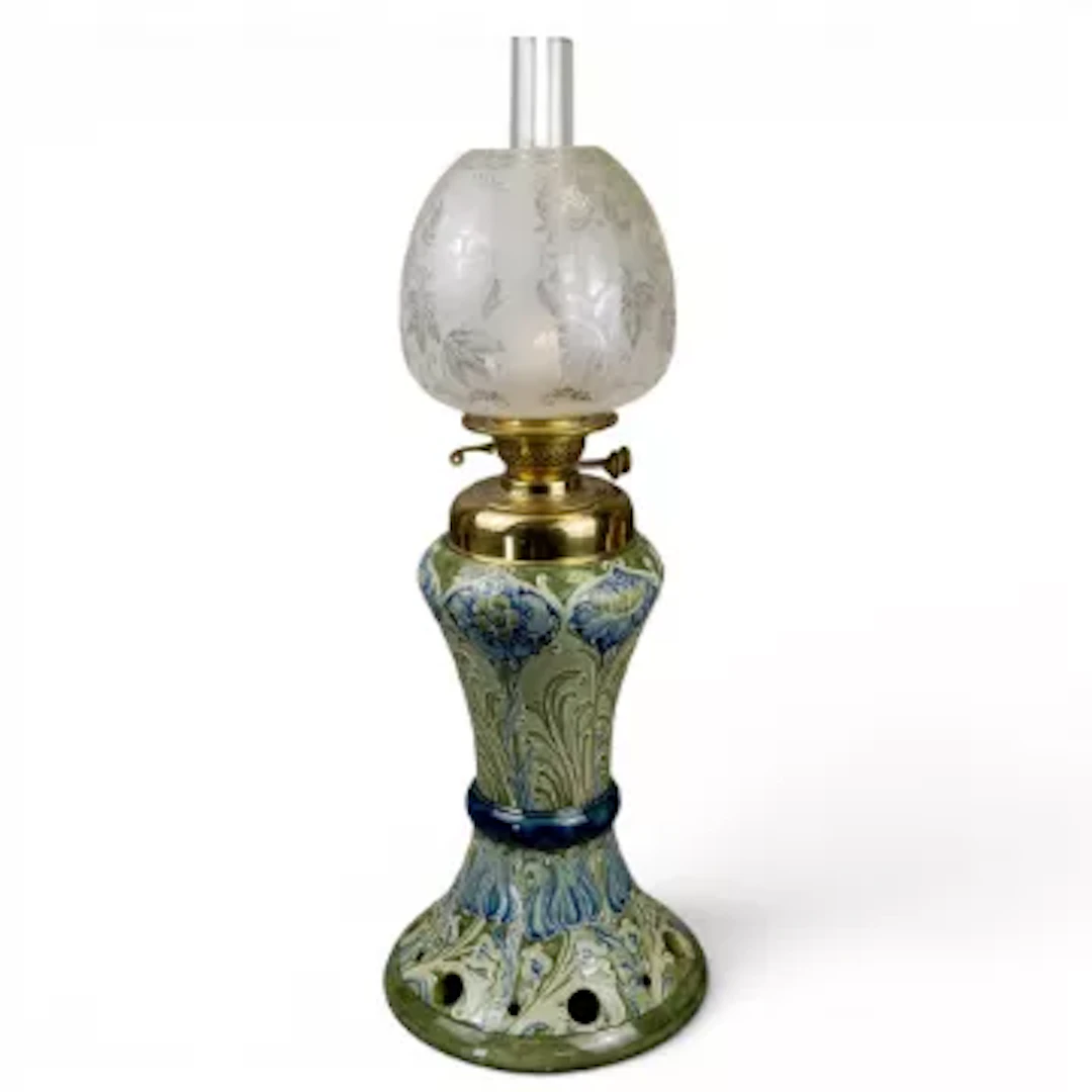 A rare Florian Ware oil lamp by William Moorcroft , c1900, decorated