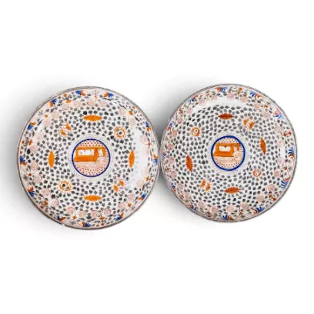 Two Thomas Wolfe shallow dishes, c19th century, decorated with iron