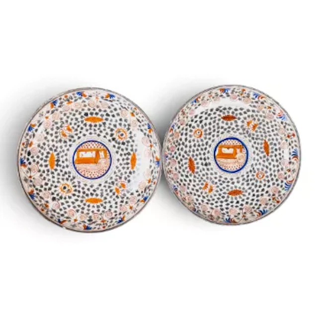 Two Thomas Wolfe shallow dishes, c19th century, decorated with iron