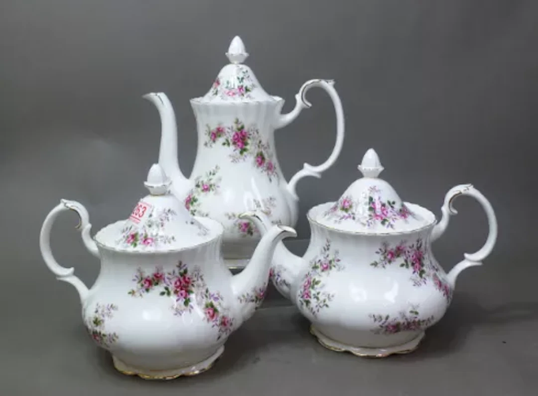 Royal Albert Lavender Rose pattern large teapots x 2, together with