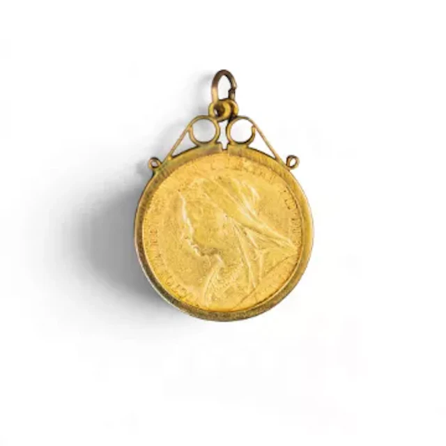 Victoria gold FULL sovereign, dated 1900, in 9ct gold mount, 9.5g.