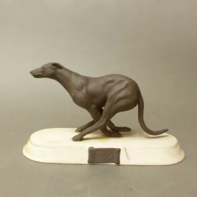 Heath House Studio Pottery figure of a greyhound, length 18.5cm.