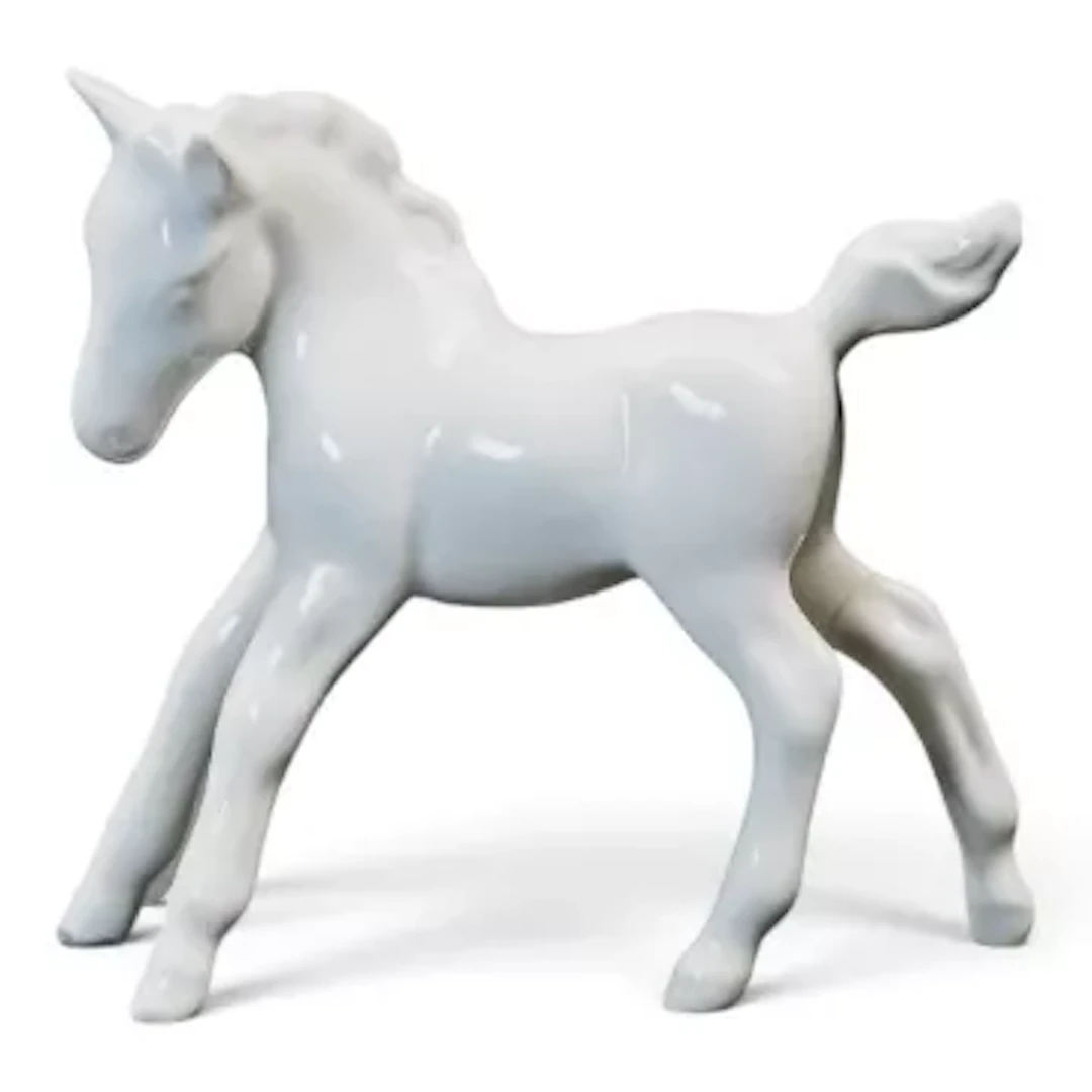 Beswick gambolling foal in opaque gloss. Model 996. h.8cm.