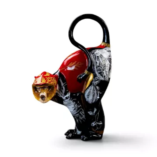 Alex Hooper for Minton, A gilded monkey uniquely decorated with red