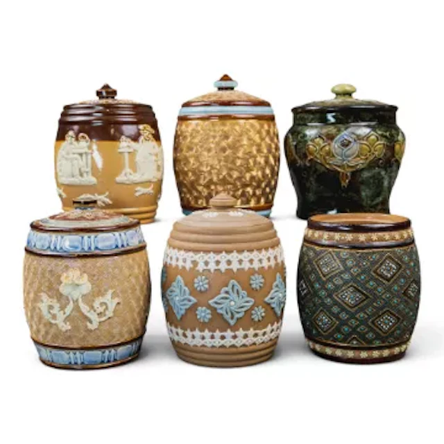 A group of 6 Doulton Lambeth ware tobacco jars to include a Silicon