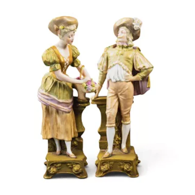 A figure of a Gentleman & woman by Ernst Wahliss, dressed in period