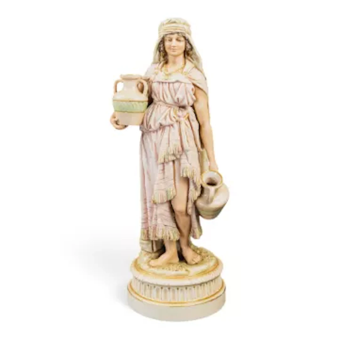 A Royal Dux figure of a water maiden, decorated in usual blush colours