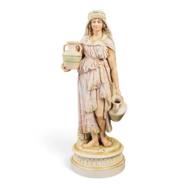 A Royal Dux figure of a water maiden, decorated in usual blush colours