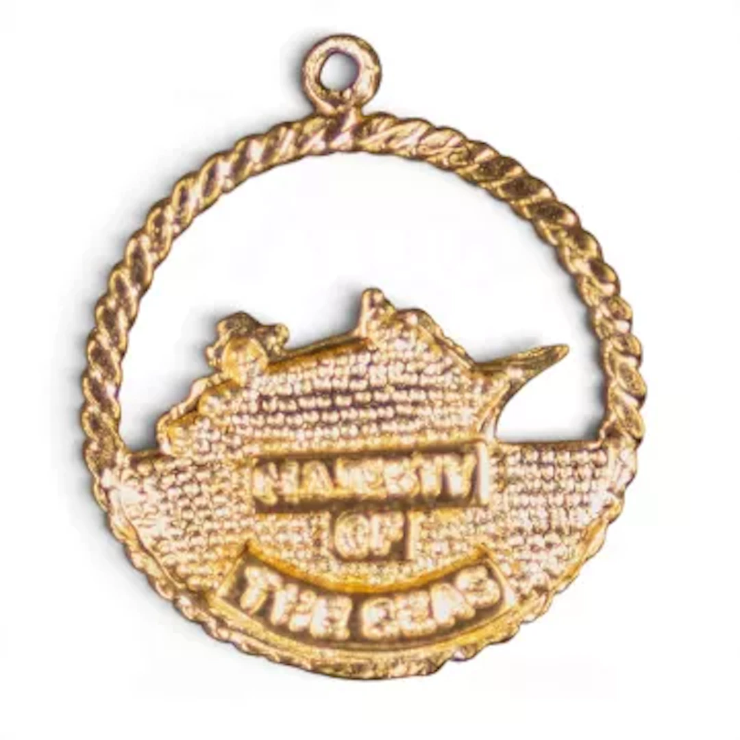 Yellow metal ship pendant "Majesty of the seas", electronically tested