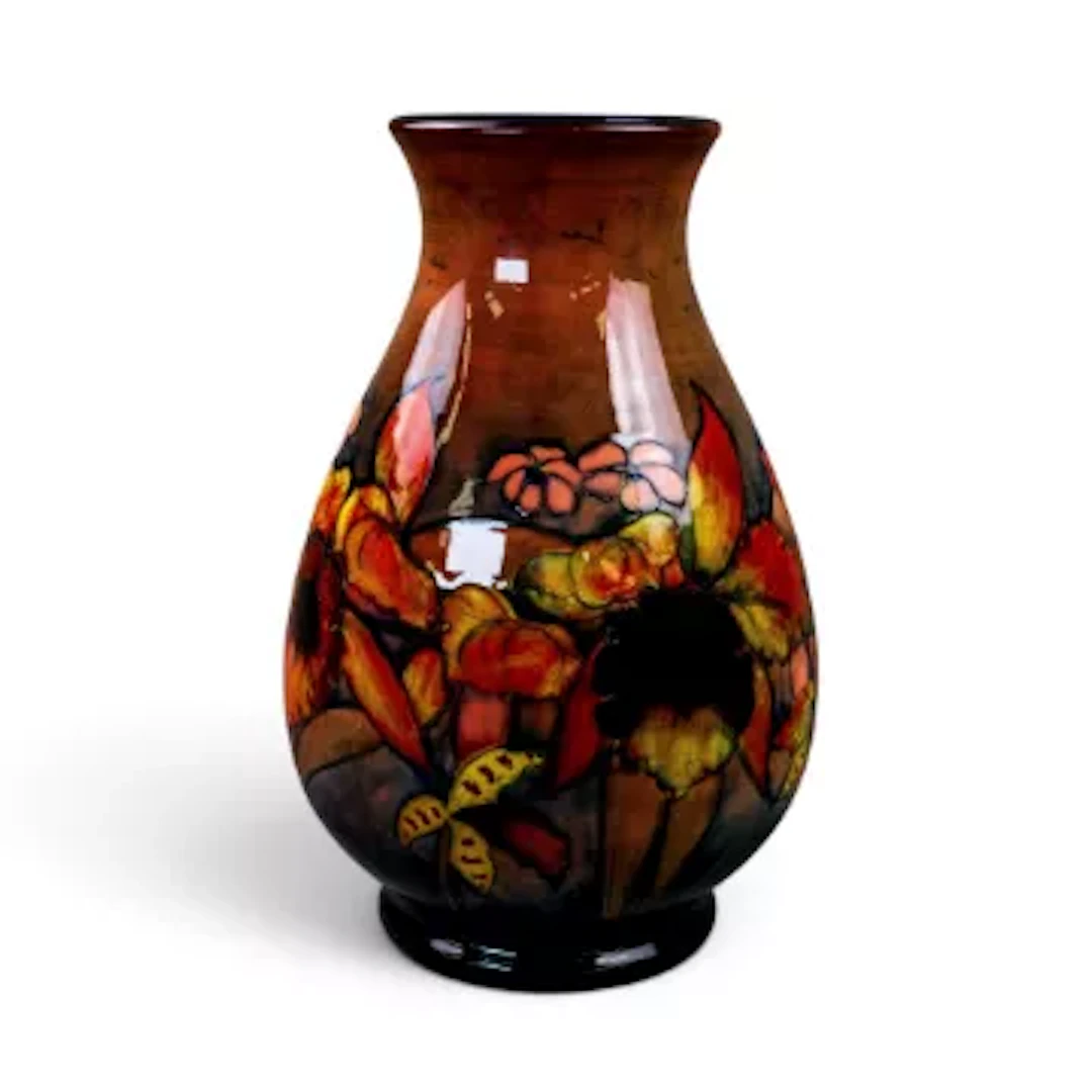 A large Moorcroft flambe vase in the Orchid pattern by William Moorcroft