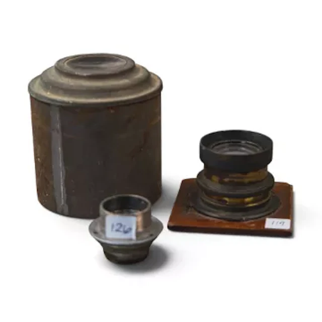 Late 19th/early 20th century large-format brass camera lens, mounted