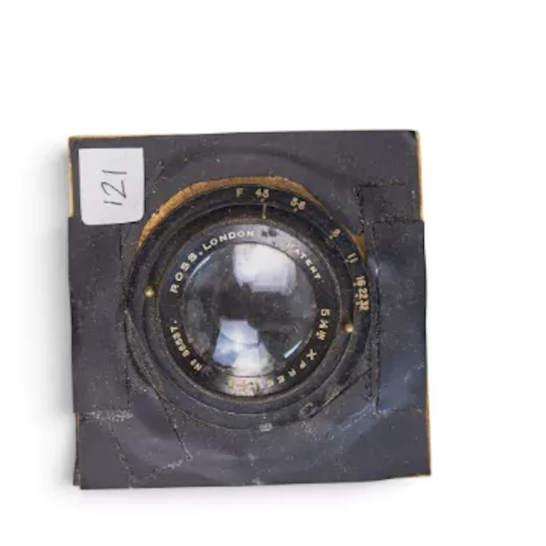 Ross London 5 1/2 inch f/4.5 Xpres camera lens, mounted on cut-out panel.