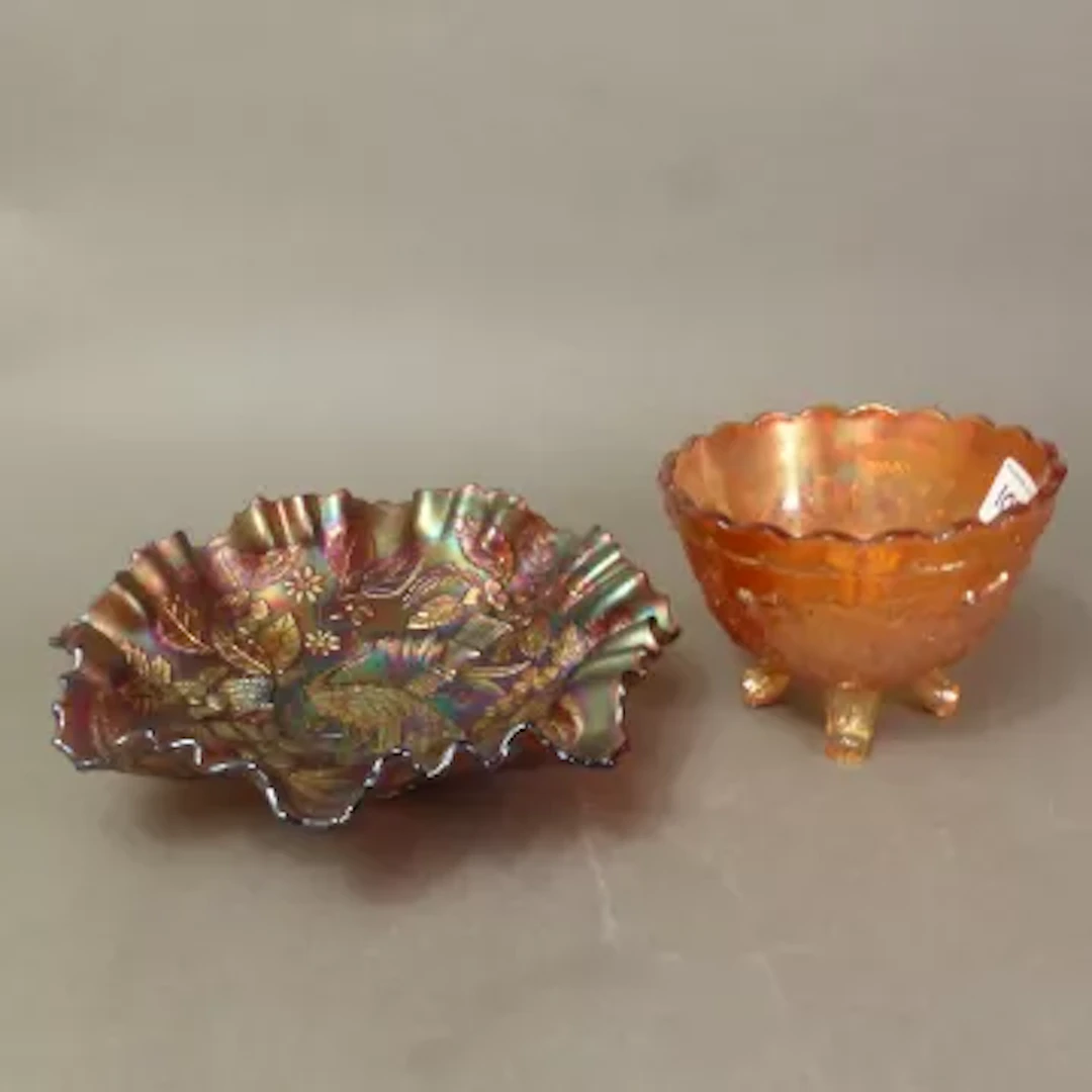 An early 20th Century Carnival glass bowl with wave edged rim, likely
