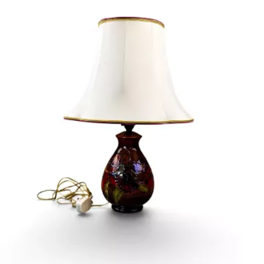 A Moorcroft flambe lamp in the Orchid pattern by Walter Moorcroft