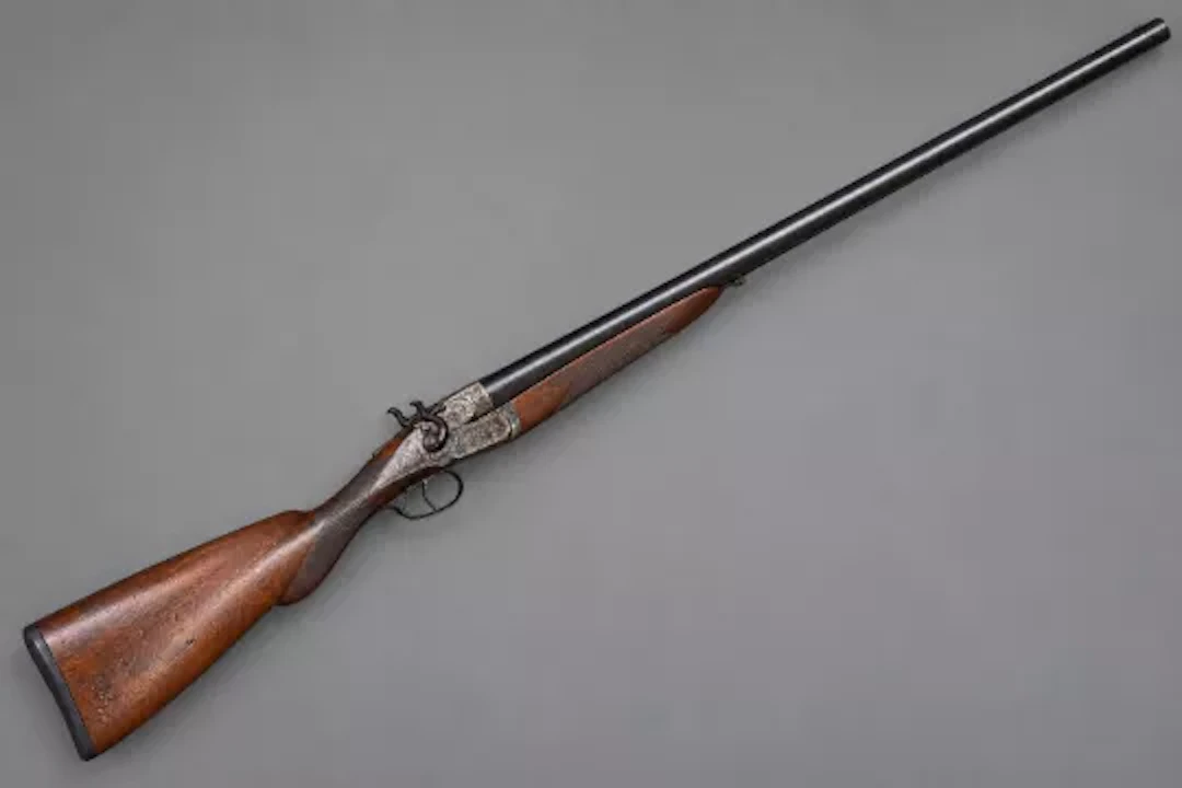 Antique early 20th century side by side double barrel shotgun. Frazer