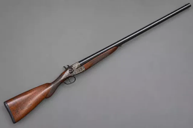 Antique early 20th century side by side double barrel shotgun. Frazer