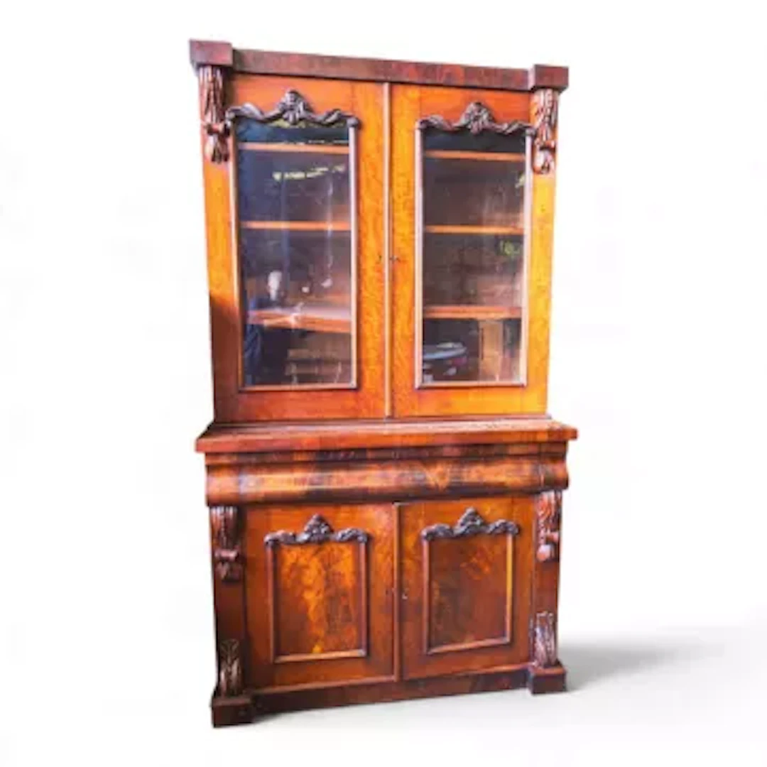 Victorian flamed mahogany two tier glazed bookcase and cabinet, featuring