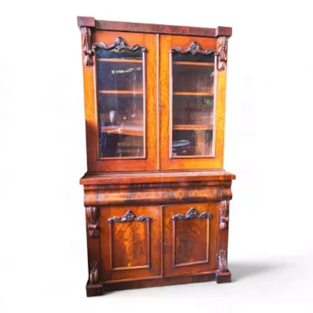 Victorian flamed mahogany two tier glazed bookcase and cabinet, featuring