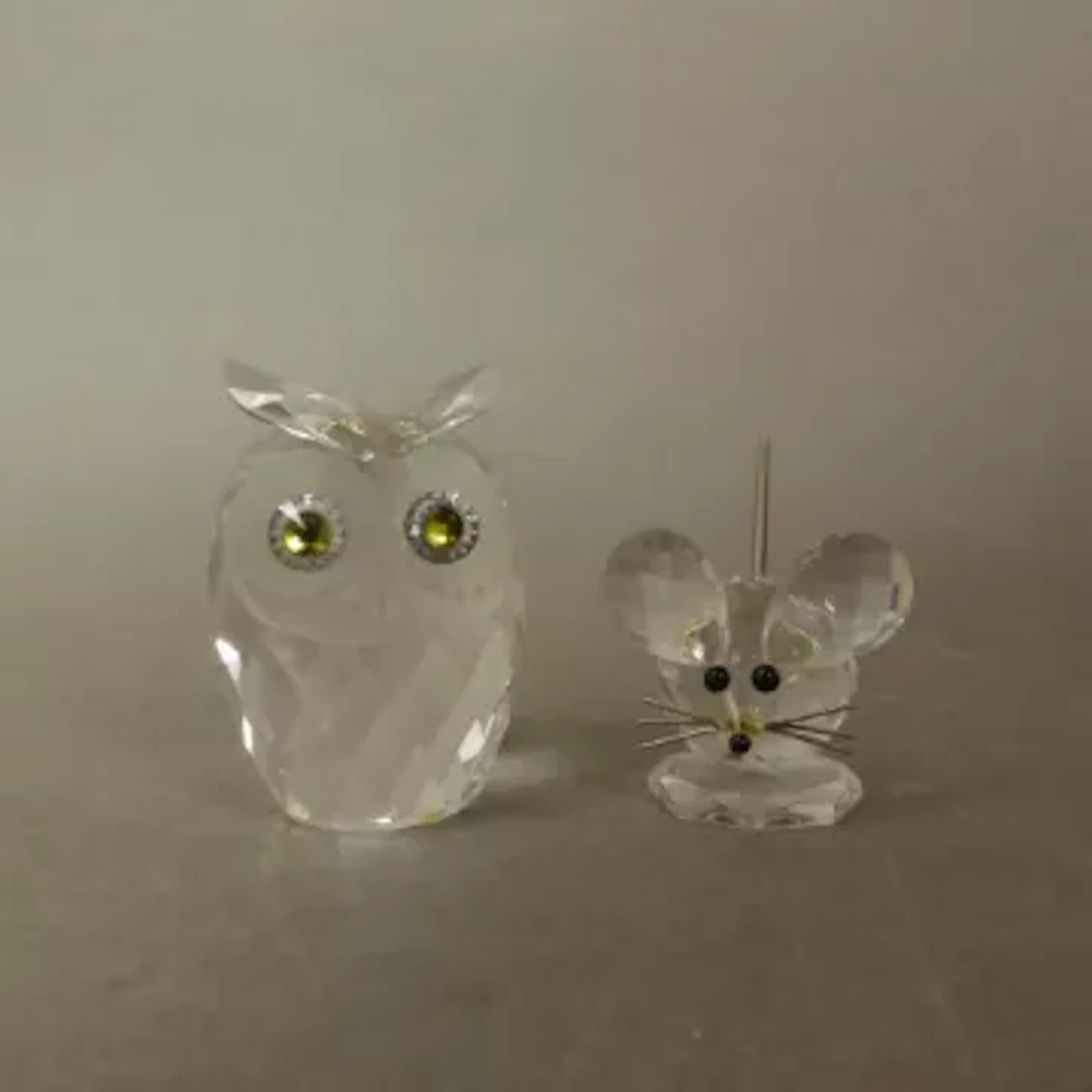 Swarovski crystal figure of an owl, together with a mouse, tallest 6.5cm (2).