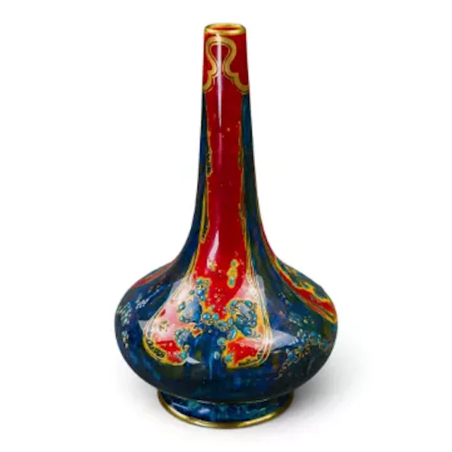 A Bernard Moore bottle shaped Flambe glaze vase, with gilt & enamel