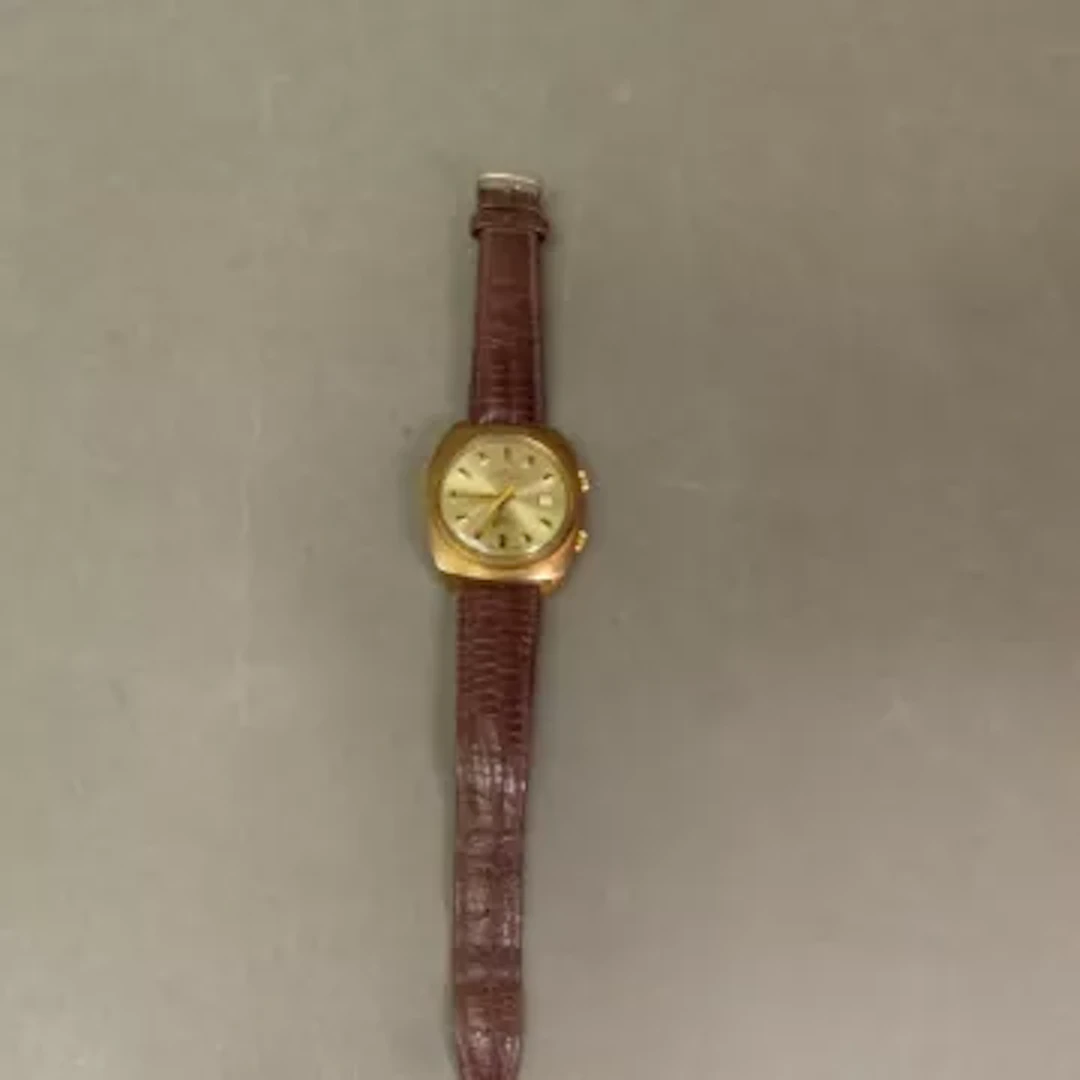 A Swiss made Jaquet-Droz 17 jewels Incabloc watch, alarm, date aperture
