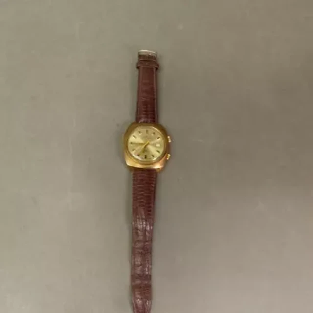 A Swiss made Jaquet-Droz 17 jewels Incabloc watch, alarm, date aperture