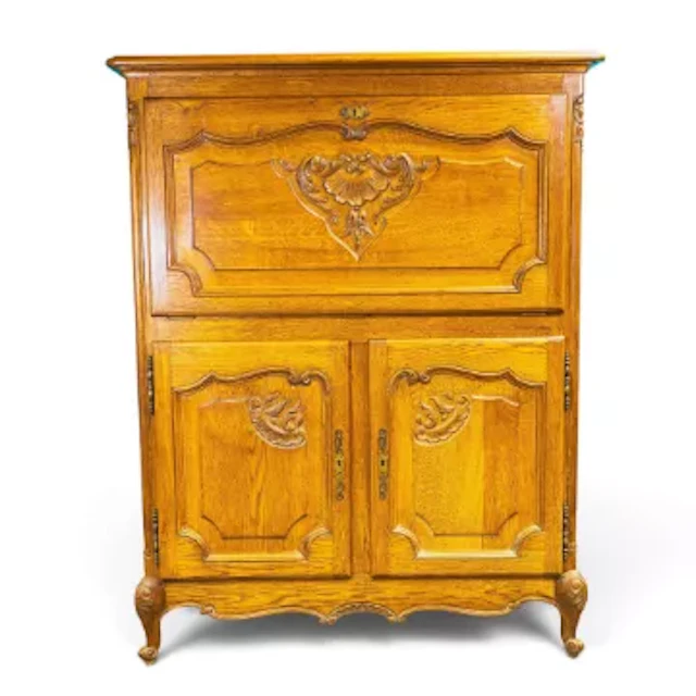 Early 20th century Louis XV carved oak tall cocktail cabinet, pull