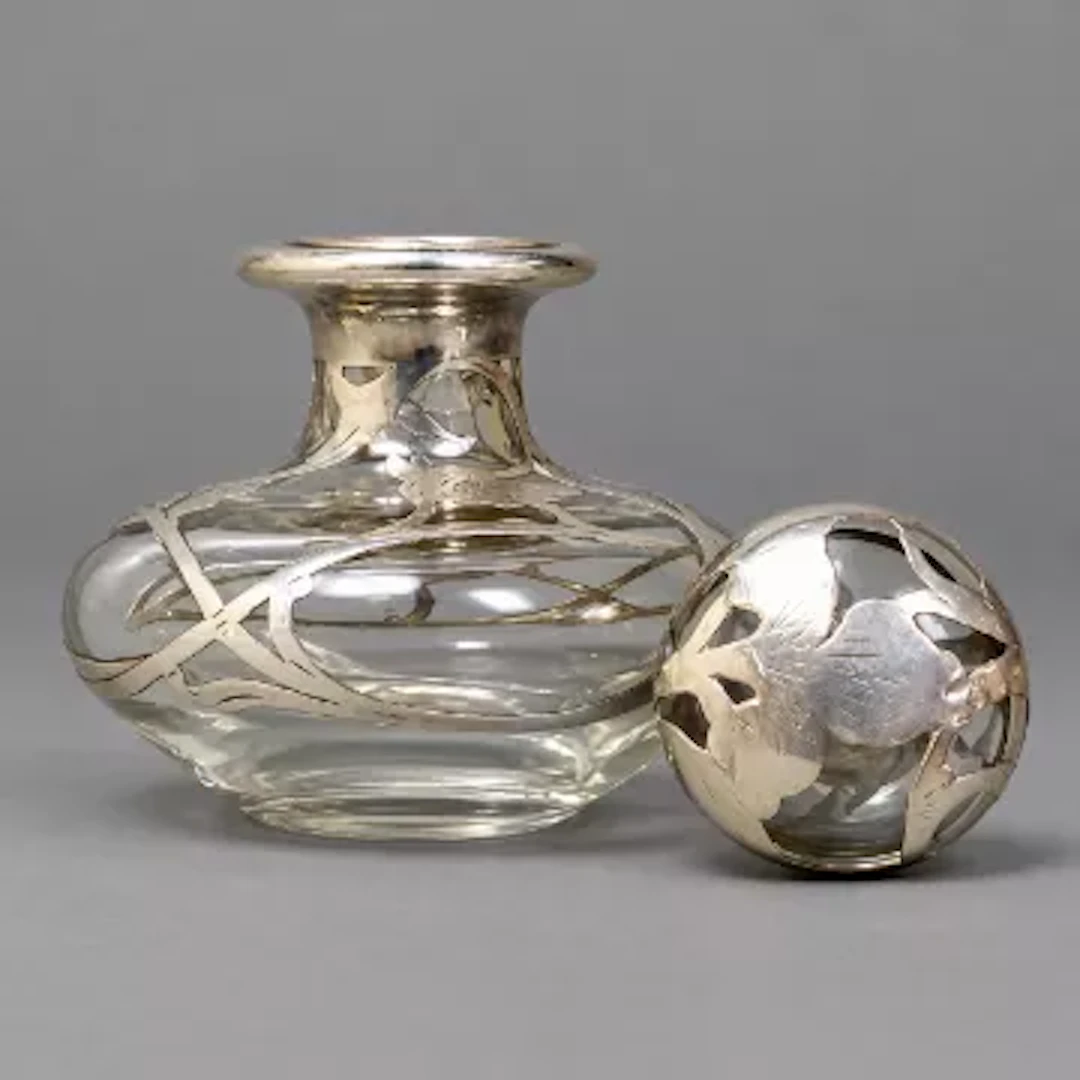 Art Nouveau silver overlaid clear glass scent bottle with stopper