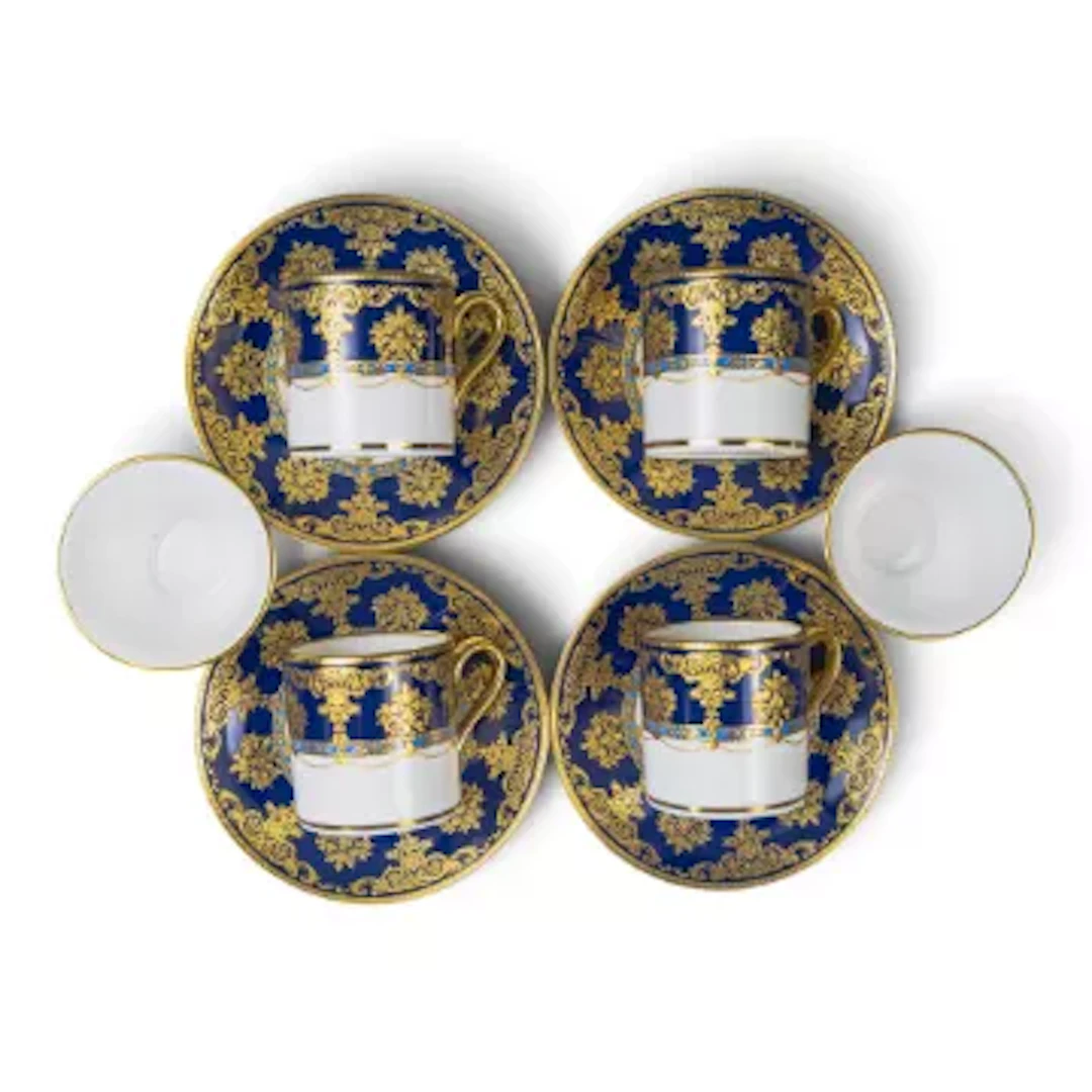 A group of De Lamerie pieces to include - 4 coffee cans with a cobalt