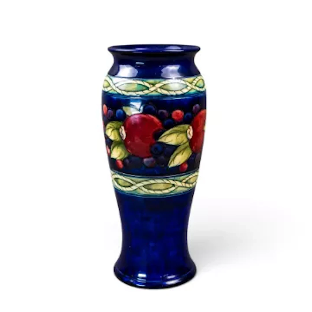 A banded Pomegranate pattern vase , designed by William Moorcroft