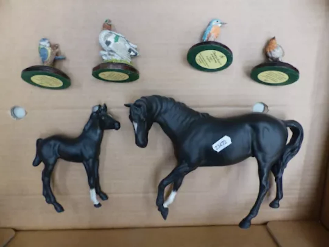 Beswick Black Beauty and Foal, together with four Country Artist's