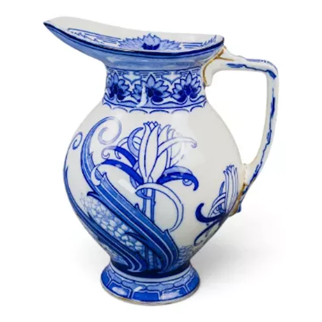 A Royal Doulton bulbous jug, in the lily pattern Art Nouveau in style