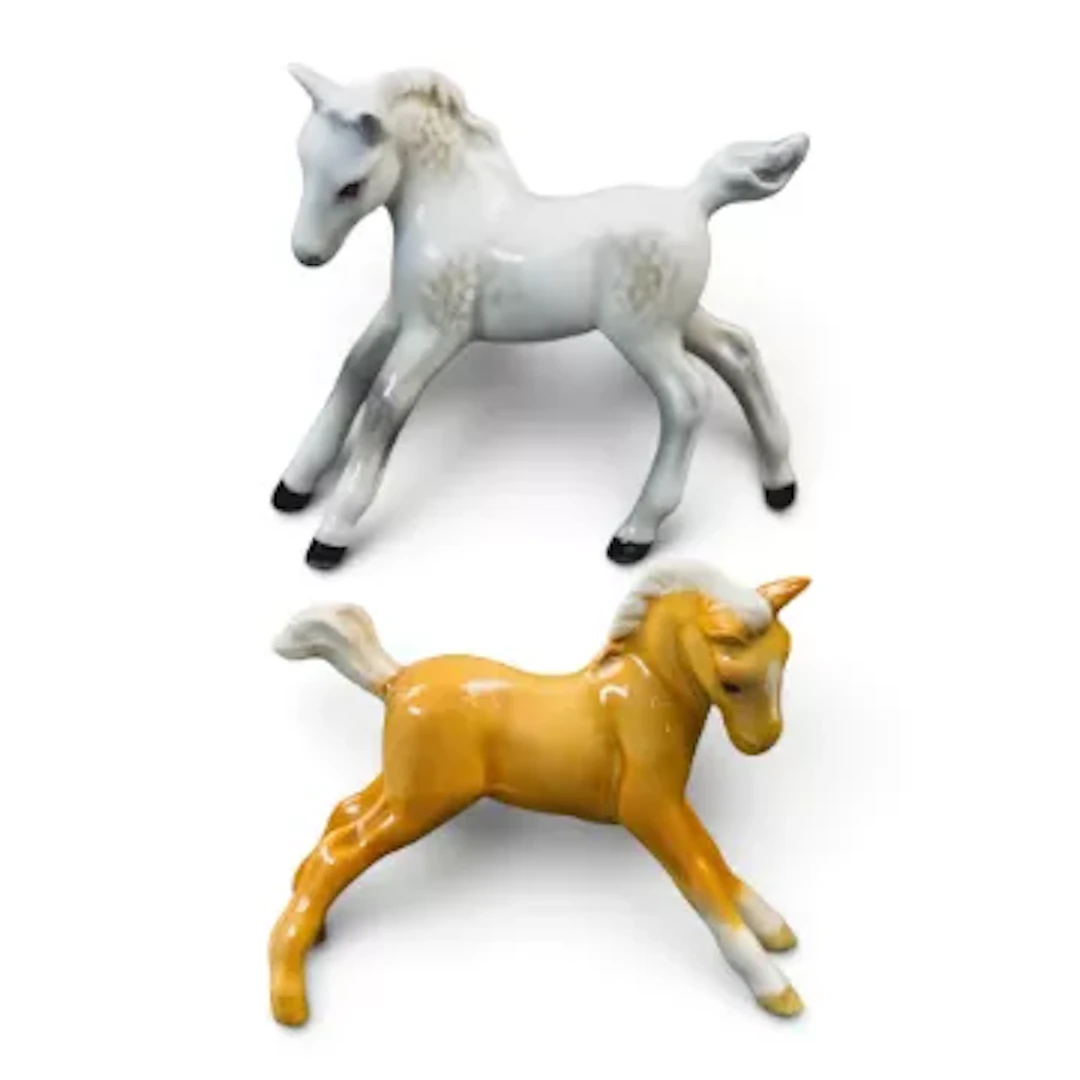 Beswick small Stretched Foal in Palomino, model 815 & Gambling Foal