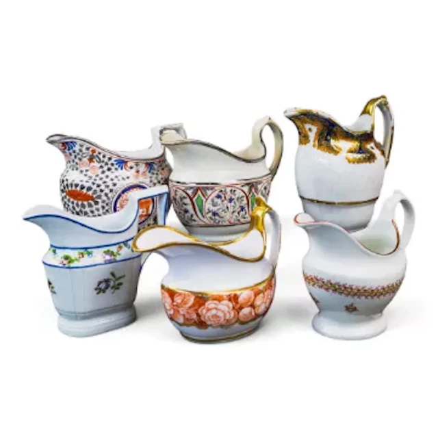 A group of 6 English porcelain 19th century cream jugs by various
