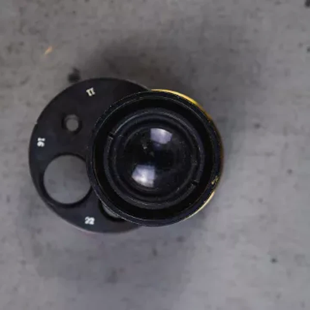 Voightlander Anastigmat II brass 136mm f/1.8 lens with a rotary wheel