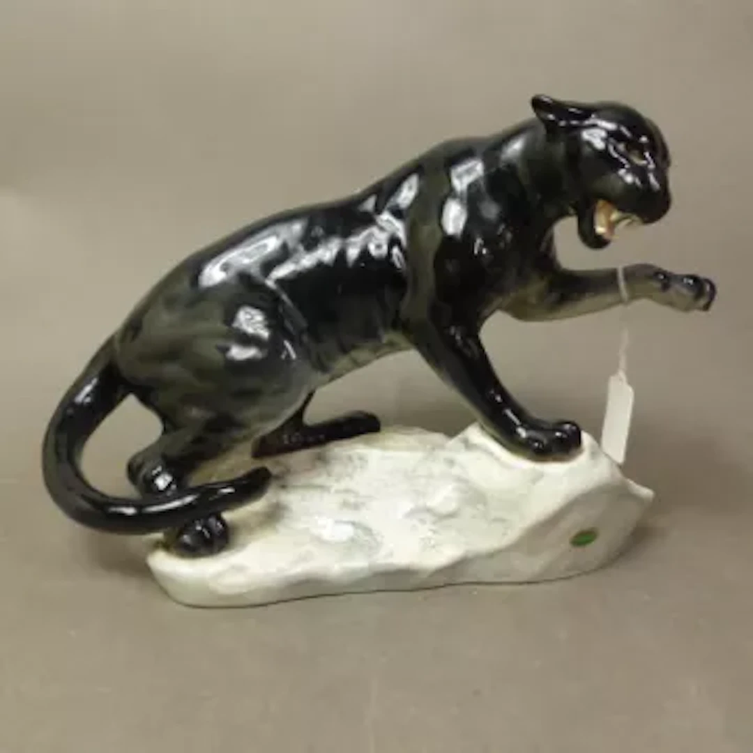 Beswick Black Puma on a rock, model number 1702, height 21cm.