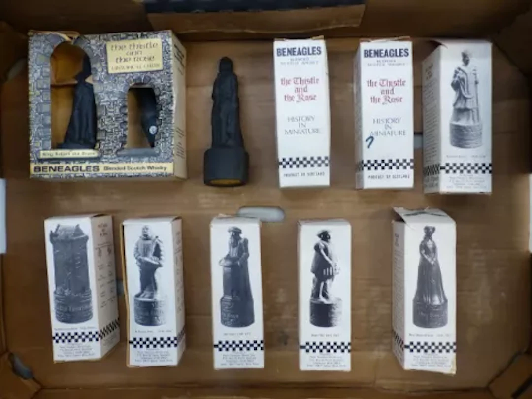 Beneagles whisky decanters in the shape of chess pieces, mostly boxed