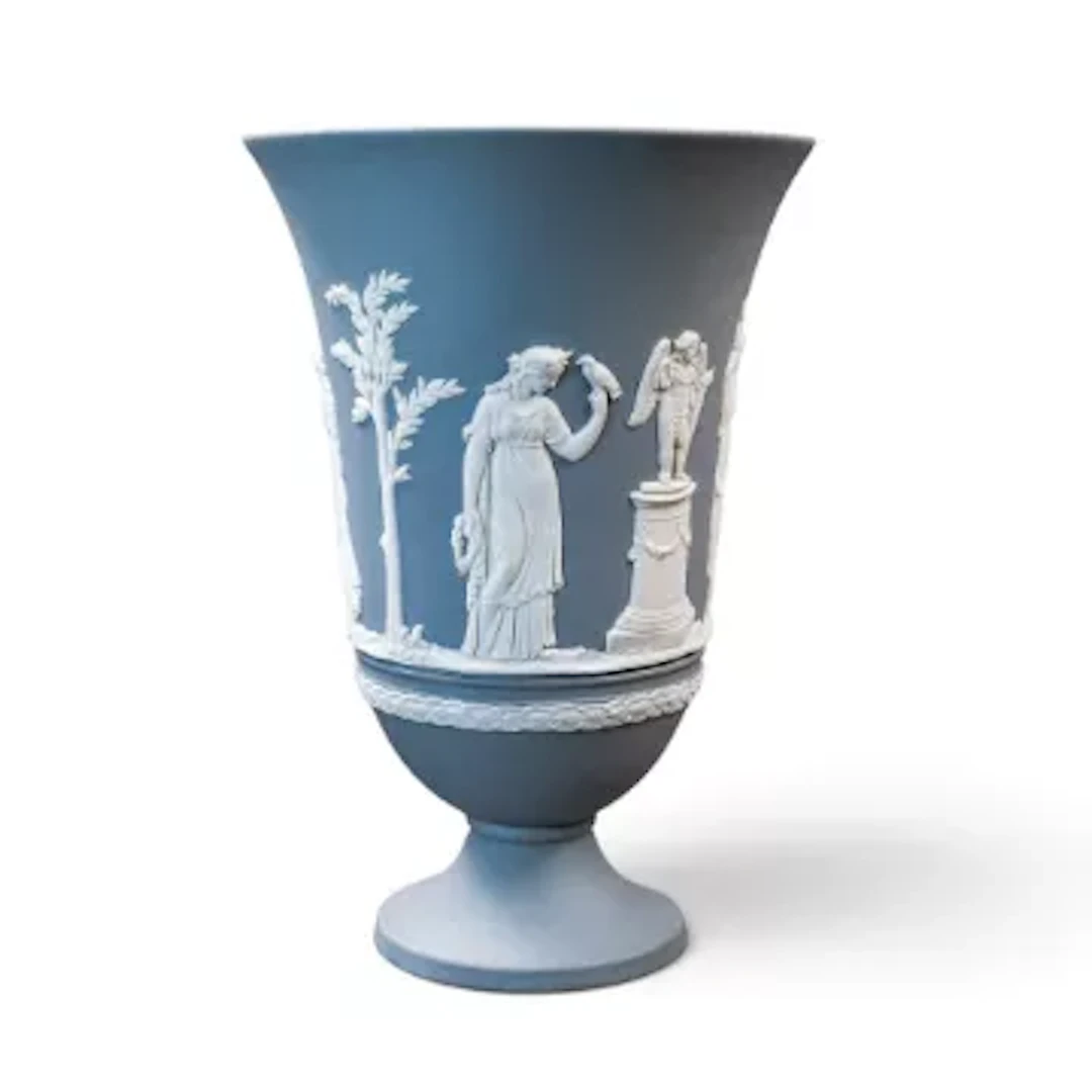 Wedgwood grey Jasperware footed trumpet vase decorated with neoclassical