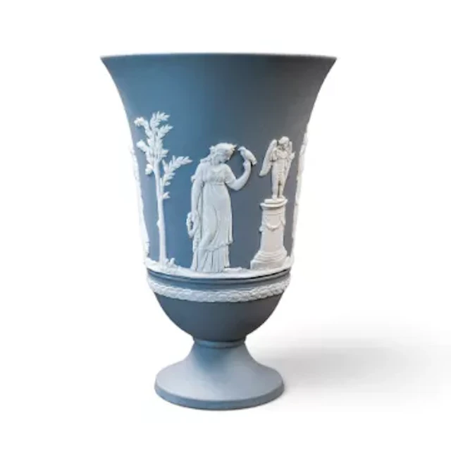 Wedgwood grey Jasperware footed trumpet vase decorated with neoclassical