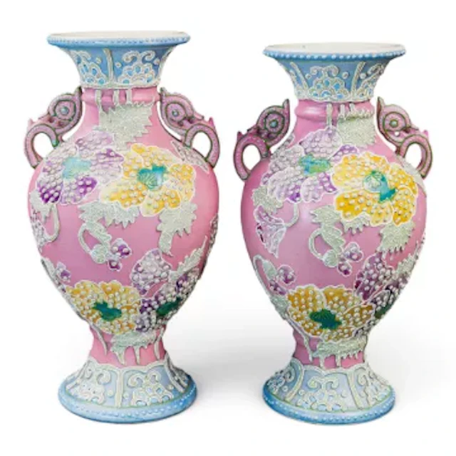A pair of Japanese porcelain handled vases with raised enamel Moriage