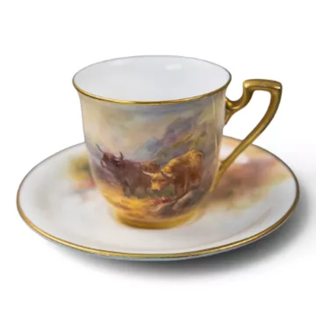 A Royal Worcester coffee can & saucer, decorated with Highland cattle