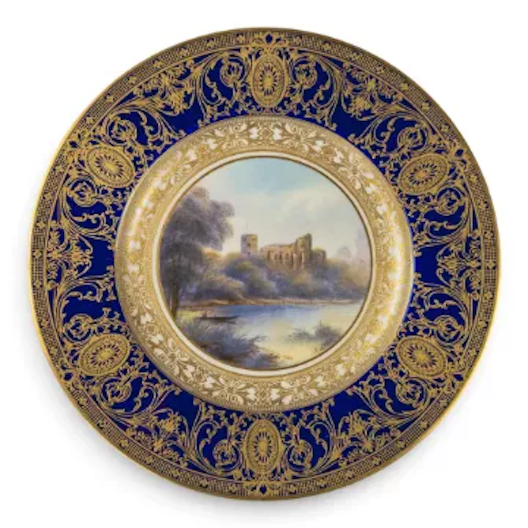 A Royal Worcester plate decorated with landscape scene of Barnard